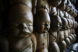 A row of baby sculptures…