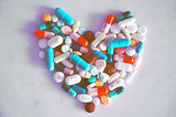 Photo of a bunch of pills shaped into a heart