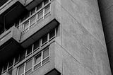 Black and white photo of a block of flats