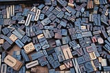 Letters and numbers on wooden stencils.