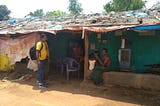 A Sun King Executive delivering clean energy products at teh customer’s doorstep