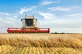 HOW WHEAT IS HARVESTED - Combine equipment in the field of wheat