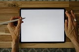Ready to draw or write on a blank tablet screen.