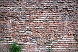 A crumbling brick wall