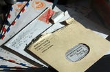 An array of envelopes containing handwritten letters