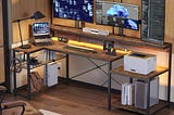 Spacious L-Shaped LED Home Office Desk with Adjustable Monitor Stand and Power Outlets | Image