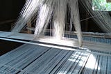 Weaving silk : a priceless skill