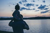 A young girl sits on her father’s shoulders. Or some man’s. Hope it’s her father. Dad 2.0 by Jim Latham is a sweet story, unlike this snarky commentary.