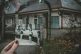 An old photo of children in front of a house