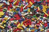 The Art of Thinking Spatially: How Toy Problems Shape Geospatial Intelligence