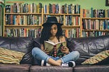 teen girl reading a book