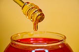 How raw honey supports skin health through enzymes, antioxidants, microbiome balance, pH regulation, and protection against inflammaging and oxidative stress