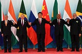 The Shift Away from the US Dollar: How BRICS Nations and Cryptocurrencies Are Winning and Losing