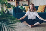 A woman meditates.