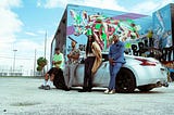 whole crew chilling by the Nissan 