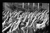 Students using the Bellamy Salute