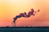 A factory producing smoke and air pollution.