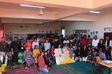 A group picture of the participants of PCD Bangalore — group of people in the center are holding the “Data Selfie” installati