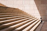 Child looking at stairs.