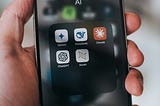 A folder of AI apps on an iPhone.