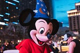 Mickey mouse with a wizard head.