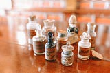 A collection of small antique apothecary bottles