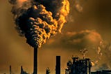 A chemical plant or refinery billowing out pollution. CoCreation Station, Discover your Calling, Brain toxins, Brain Health, Health