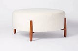 elroy-faux-shearling-round-cocktail-ottoman-with-wood-legs-cream-threshold-designed-with-studio-mcge-1