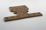 Scrabble Letters Spelling Out “Fail Your Way To Success”