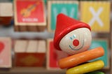 Colorful children’s toys, smile stuck in place