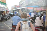 Lady wearing a school bag