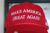 Make America Great Again hat in red with the American flag on the right side