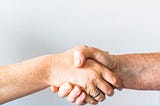 two people shaking hands