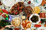 A dining table laden with beautiful home-cooked food