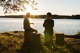 two-men-discussing-work-outside-office