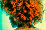 Curly and messy bright orange hair,.