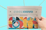 A random newspaper with the title “Good Newspaper” on the front, with lots of colorful graphics underneath, and a light blue background behind the newspaper.