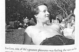 Black and white photo scanned from a newspaper of Lou Sullivan. He lays in the grass, shirtless, content. The caption on the photo says “For Lou, one of life’s greatest pleasures was feeling the sun on his smooth, masculine chest. Here he is picnicking with friends at Golden Gate Park in 1981. (Courtsey of Flame Sullivan)”