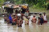 Some people of Bihar are migrating to the another place carrying their household goods as their house in completely destroyed by the floods in the Koshi river.