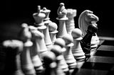 Chess: Why black dominate white?