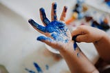 A child trying to paint