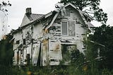 An abandoned house, falling apart.