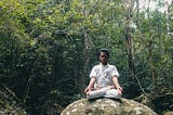 Lotus position or Padmasana is a cross-legged sitting meditation pose from ancient India, in which each foot is placed on the opposite thigh. It is an ancient asana in yoga, predating hatha yoga, and is widely used for meditation in Hindu, Tantra, Jain, and Buddhist traditions.