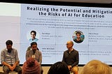 Sal Khan, Chris Piech, and John Mitchell sitting on stage in front of a slide projected on the wall titled “Realizing the Potential and Mitigating the Risks of AI for Education”