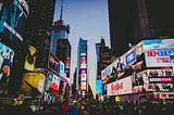 Advertisements at Times Square at night.