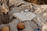 Reading poetry during a picnic.