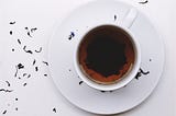 Why Do Tea Leaves Gather At The Center Of A Cup After Stirring?