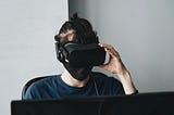 Man wearing a mask and a VR headset