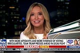 Kayleigh McEnany wears a white shirt & holds white binders whitely on Fox News