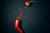 Spicy pepper symbolizing spicy writing in romance and other genres.